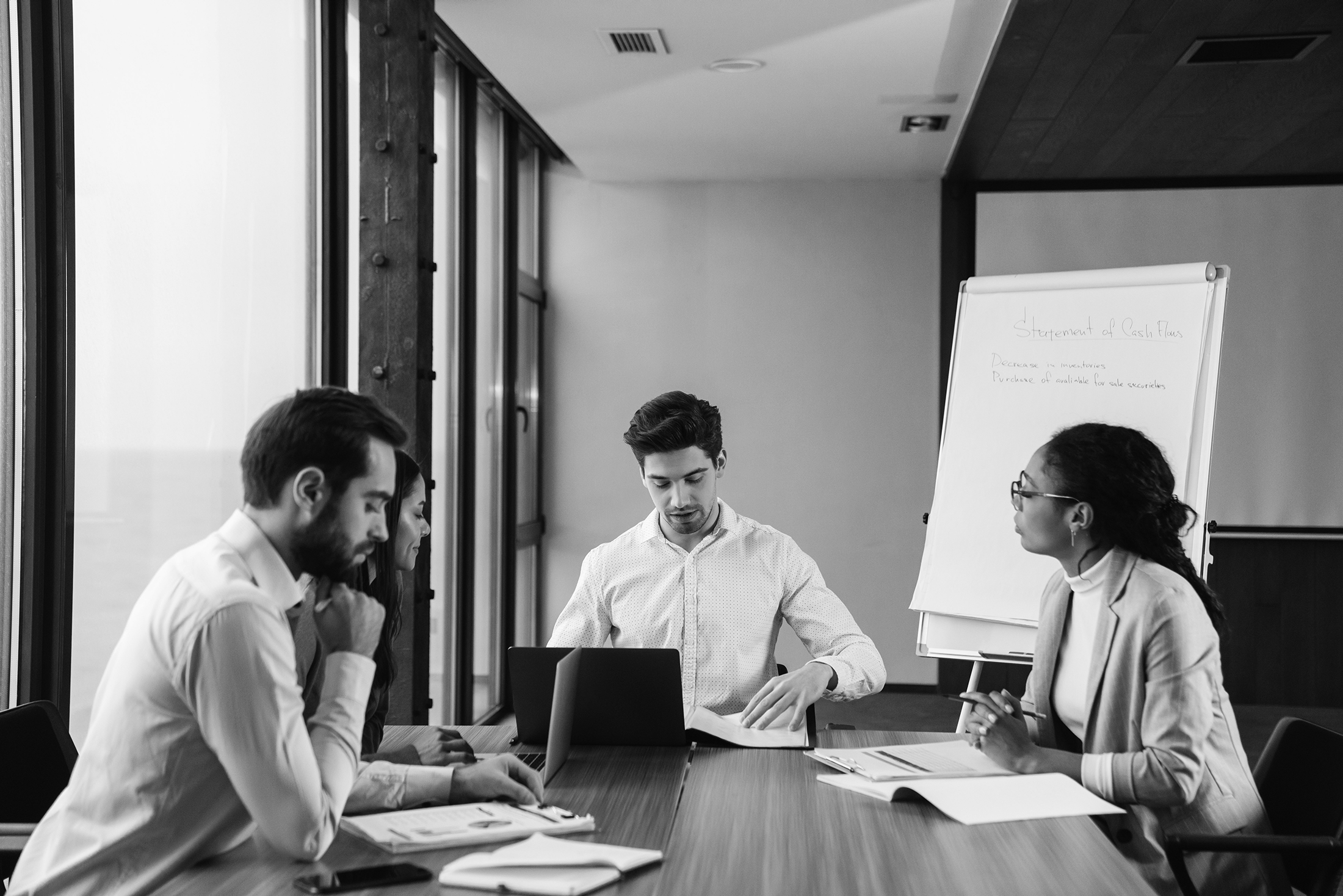 IT team working together in conference room